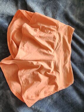 Lululemon Speed Up Shorts Womens Size 2 Coral Salmon Zip Pocket Logo Athletic